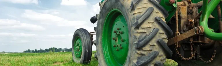 Tractor in Field Using Industrial Greases & Mobil Greases
