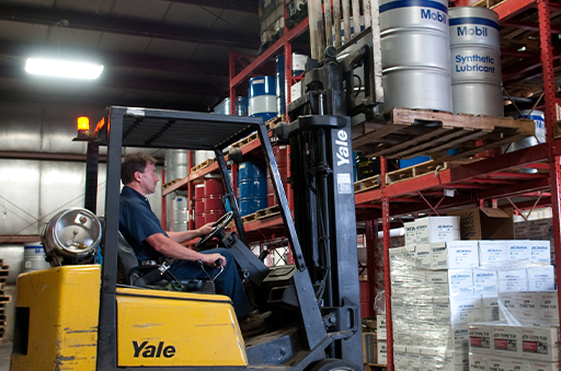 forklift carrying Mobil synthetic lubricant containers