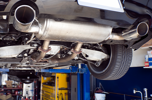 Exhaust Mufflers of a Vehicle Using Oil Dri Products